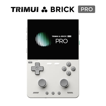 Trimui Brick Pro handheld gaming console shown on a white background with the Trimui Brick Pro logo at the top. The device has a black screen with green and white graphics, a light gray body, a D-pad, four action buttons, two analog sticks, and speaker grilles.