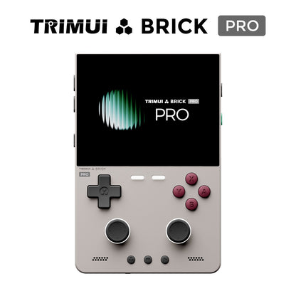 Trimui Brick Pro handheld gaming console shown on a plain white background, with the Trimui Brick Pro logo displayed at the top of the image. The console has a light gray body, a black screen, a black D-pad, and red action buttons.