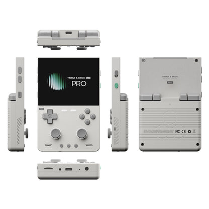 A handheld gaming console shown from multiple angles on a plain white background, including front, back, sides, and bottom views. The front displays a black screen with the text 'TRINAKA & BRICK PRO' and gray controls, while the back is light gray with ventilation slots and small printed text.